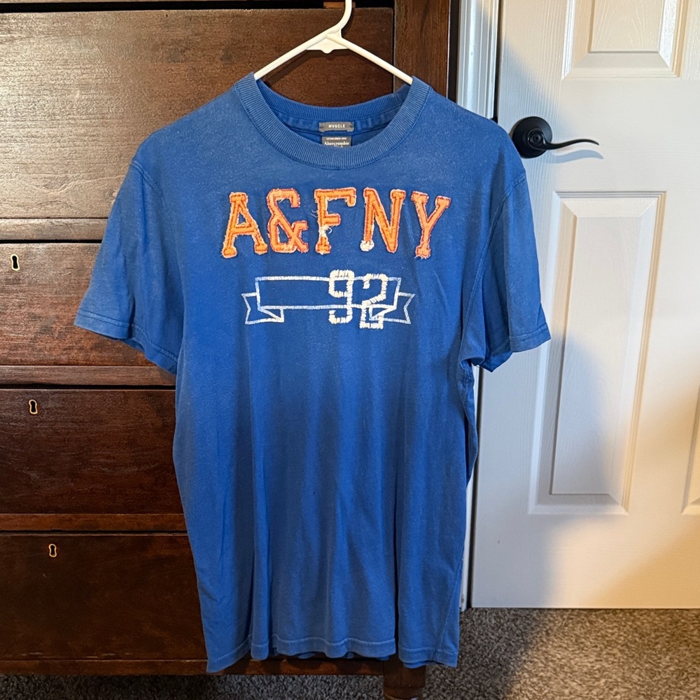 Vintage Abercrombie & Fitch Blue Short Sleeve Logo Tee with Orange Applique